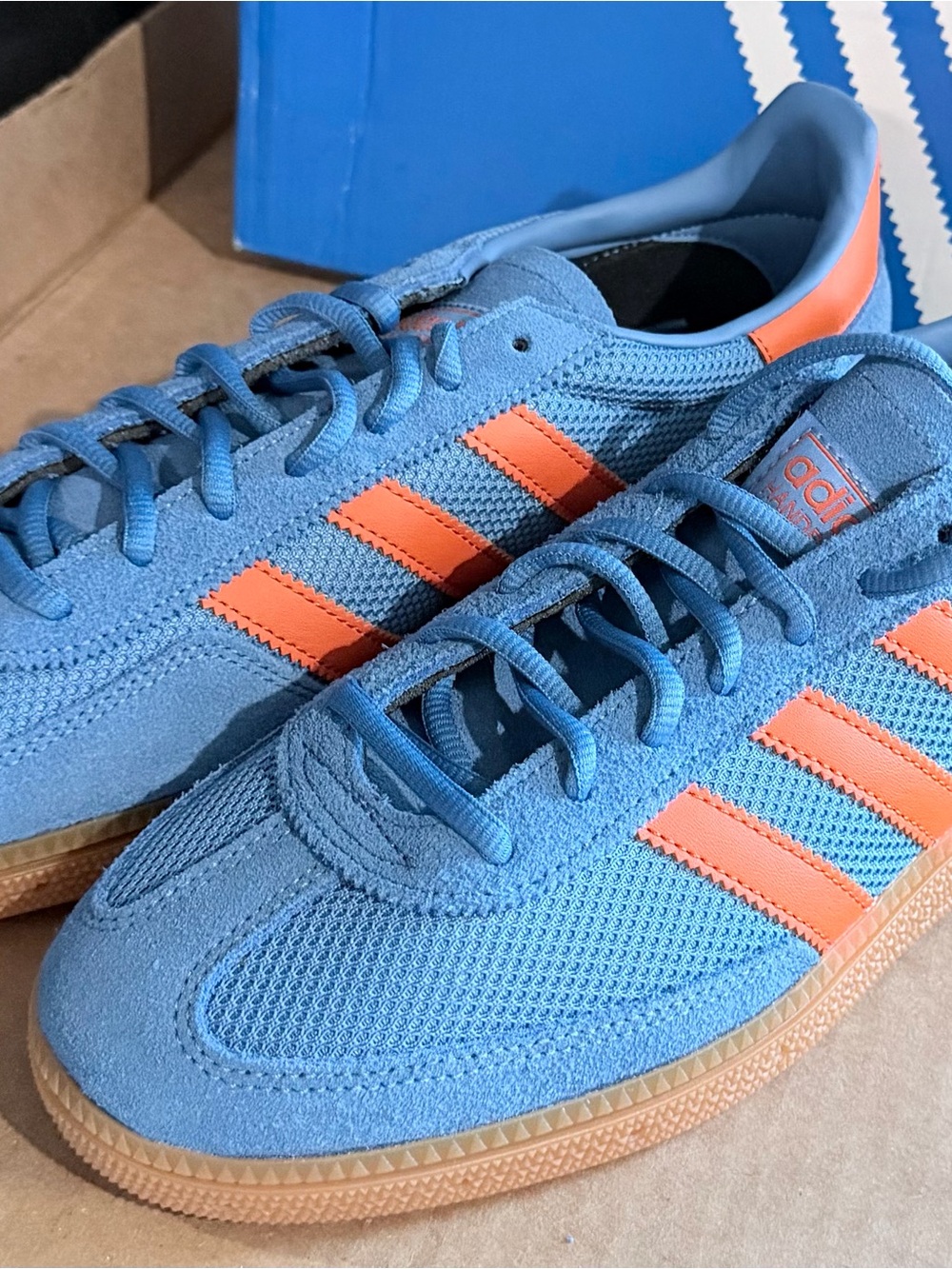 adidas Men’s Low-Profile Sneakers in Light Blue with Orange Stripes
